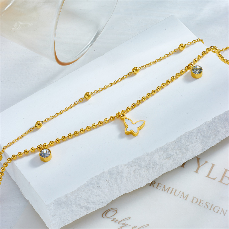 Korean style, fashionable, simple, retro, multi-layered beaded chain with diamond-encrusted butterfly pendant, stainless steel jewelry anklet.