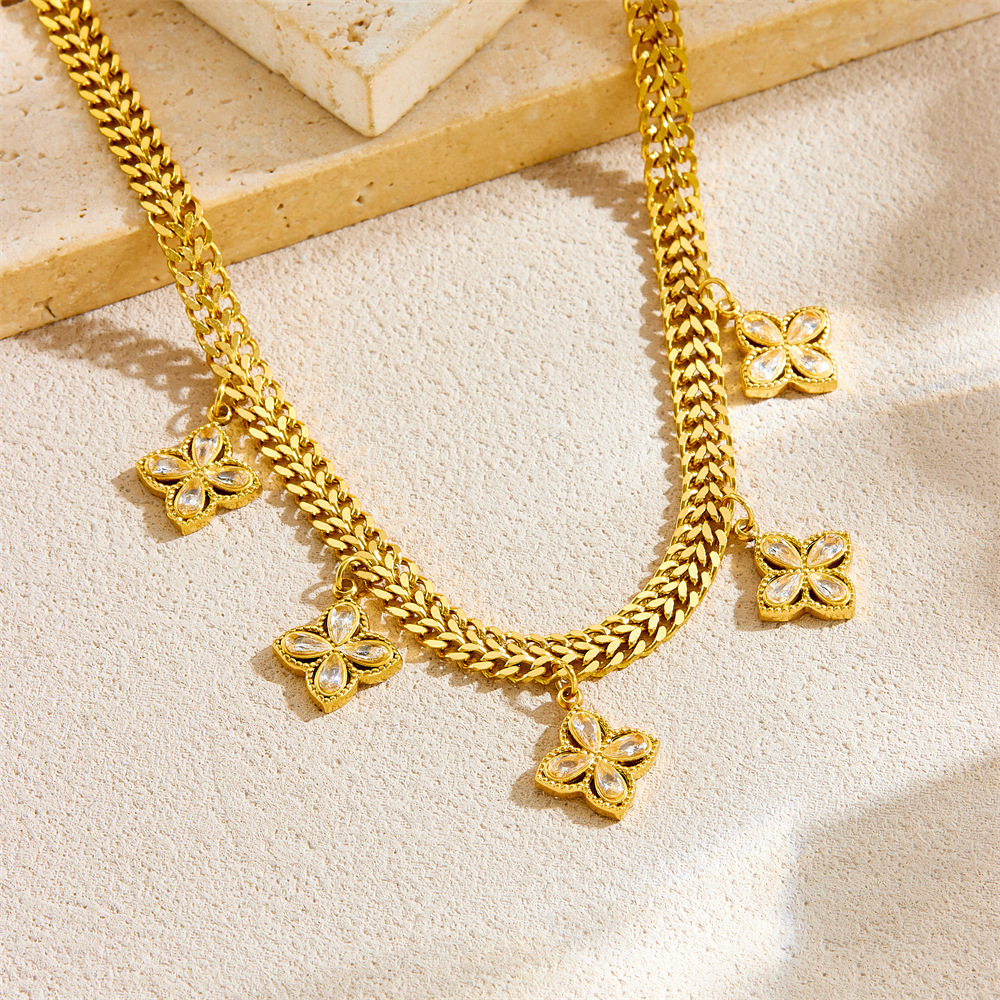 European and American style, high-end diamond-encrusted four-leaf clover pendant clavicle chain, gold-plated stainless steel snake bone necklace