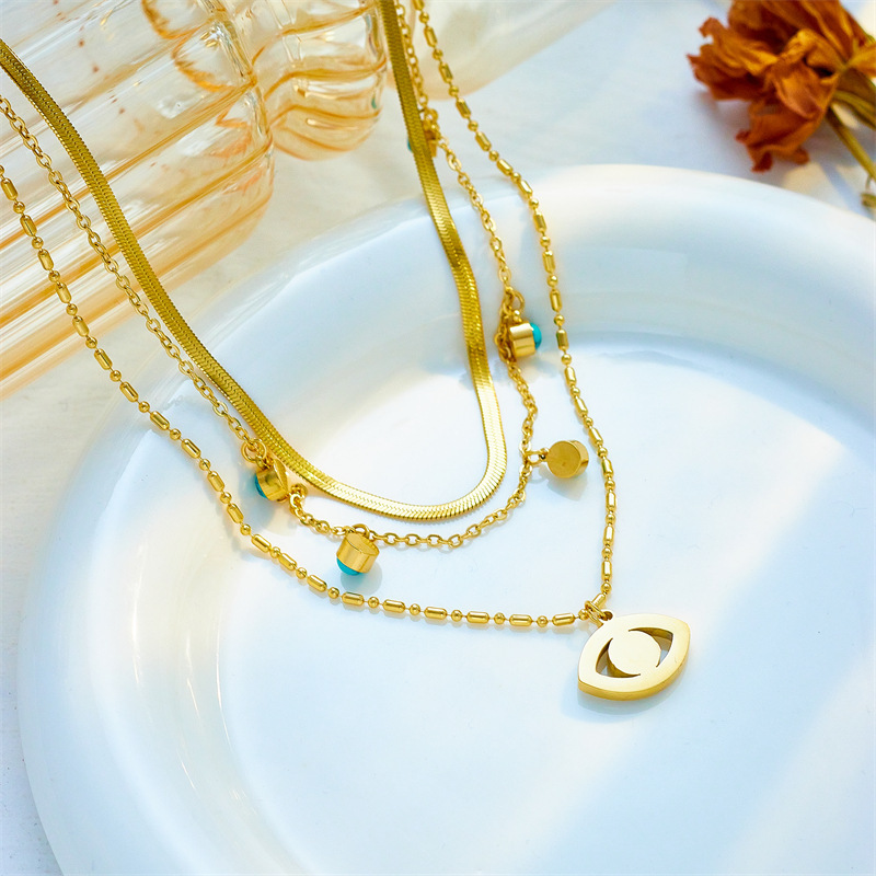 European and American cross-border fashion jewelry, multi-layered chain, turquoise, openwork, diamond-encrusted, blue eye pendant, clavicle necklace.