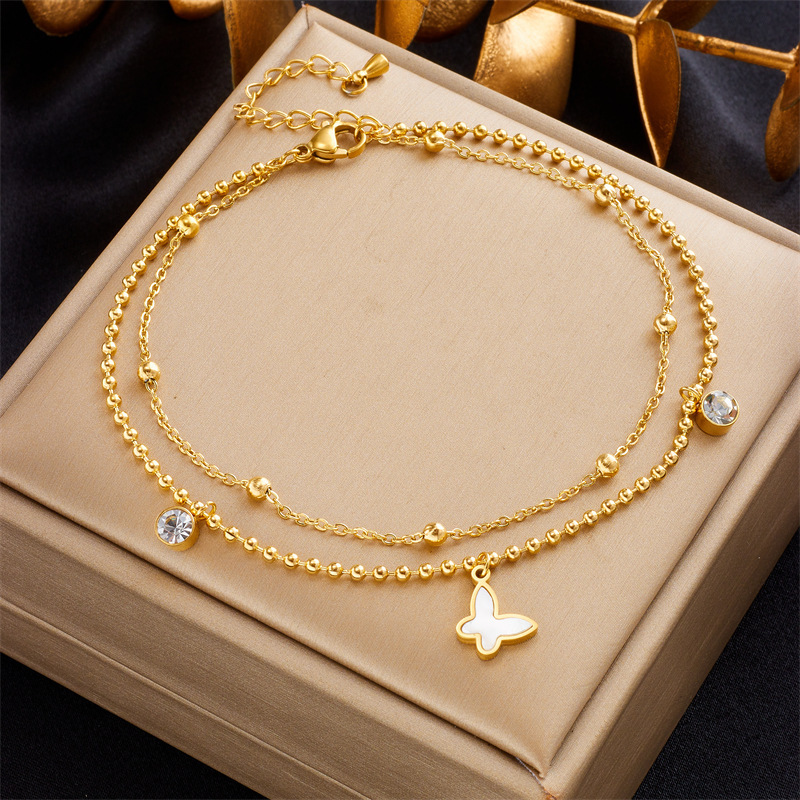 Korean style, fashionable, simple, retro, multi-layered beaded chain with diamond-encrusted butterfly pendant, stainless steel jewelry anklet.