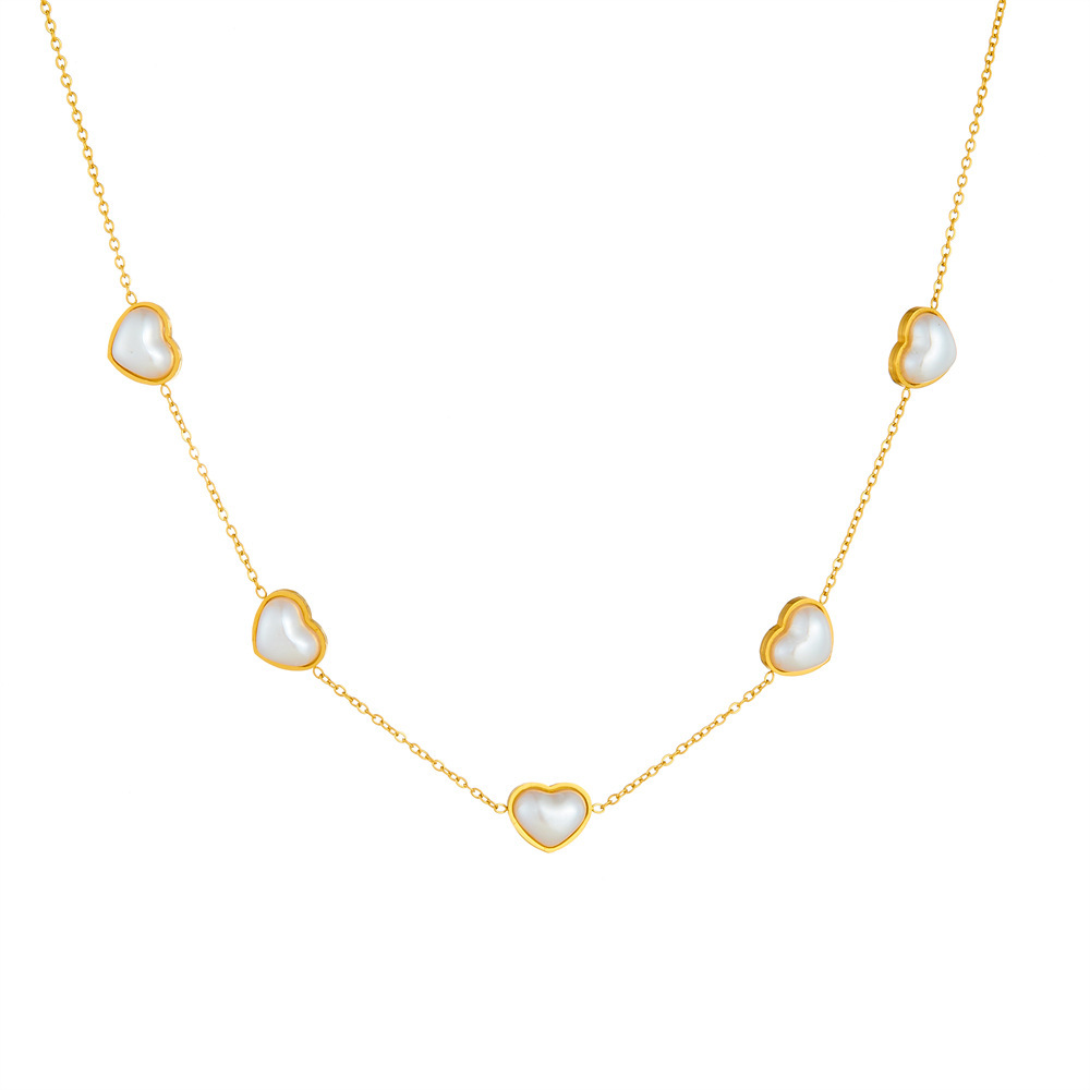 Stylish and minimalist French retro pearl heart gold-plated stainless steel O-chain bracelet, earrings, and necklace set.