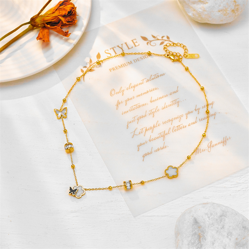 European and American style niche seashell black and white butterfly flower tassel necklace, high-end titanium steel clavicle chain