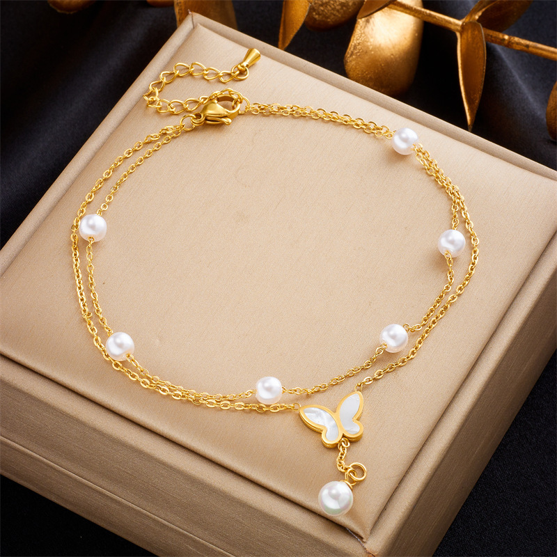 Korean style, fashionable, elegant, and luxurious multi-layered pearl butterfly tassel chain titanium steel versatile anklet