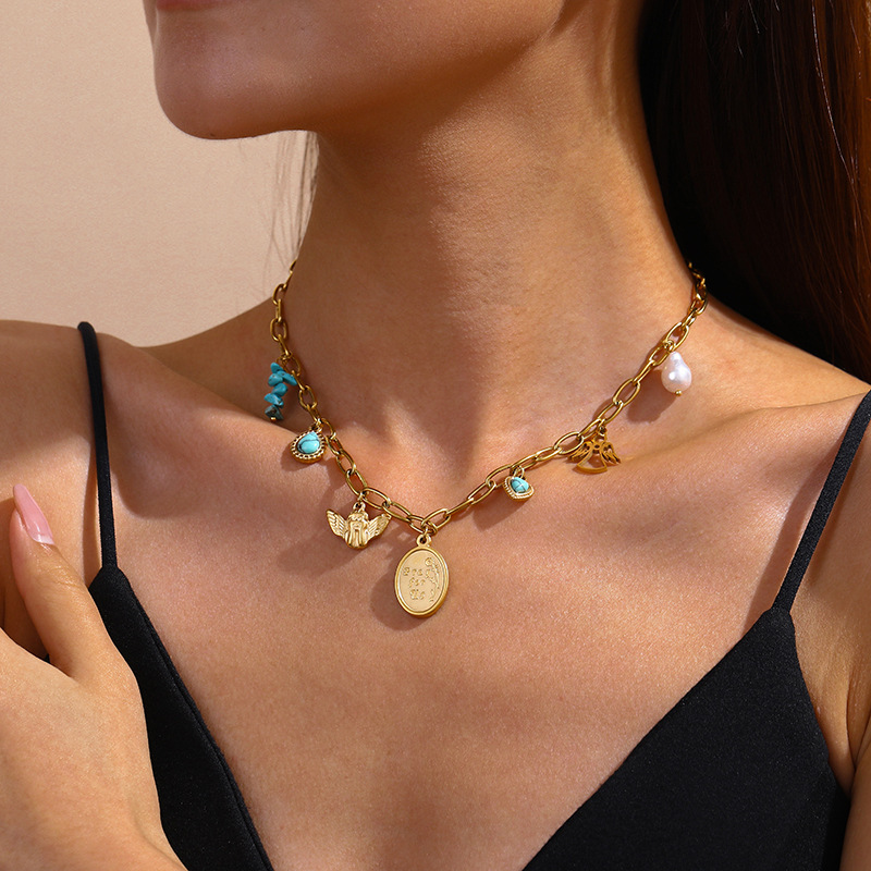 European and American retro oval logo pendant sweatshirt chain, versatile turquoise teardrop imitation pearl angel clavicle chain jewelry.