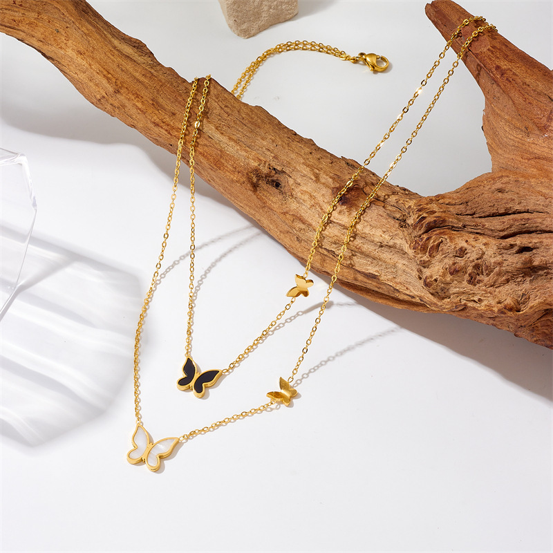 European and American style niche black and white glossy three-dimensional butterfly double chain stainless steel gold-plated jewelry necklace