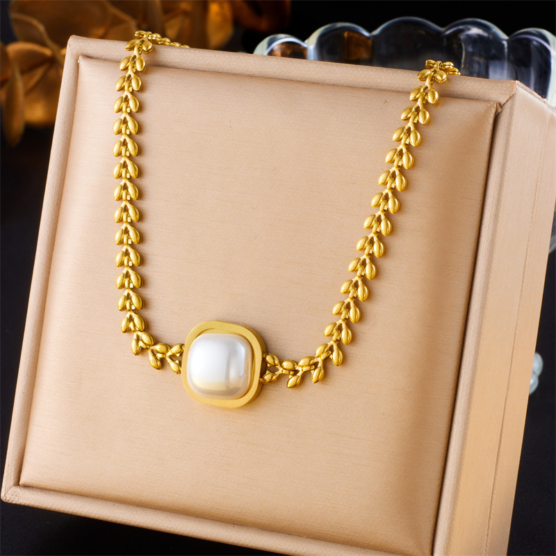 European and American style niche retro high-end gold-plated stainless steel pearl heart eye butterfly pendant multi-layer necklace