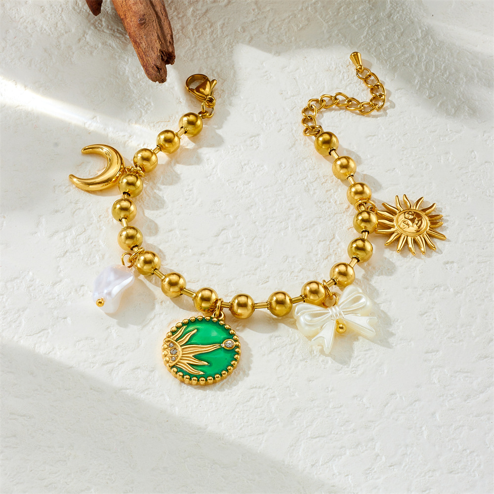 New European and American cross-border style gold-plated drip round pendant sun moon bow pearl chain stainless steel bracelet
