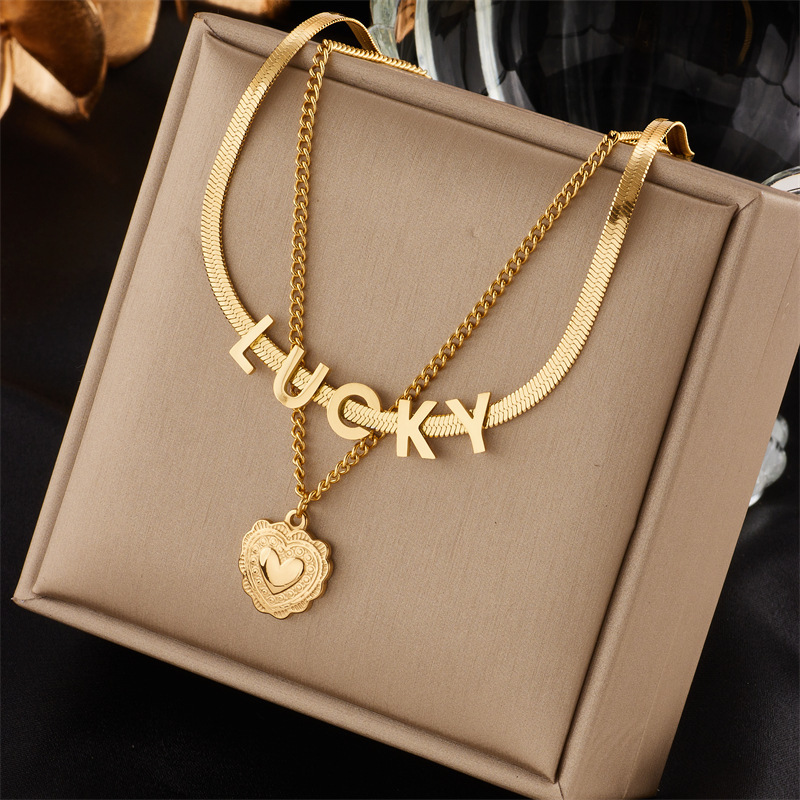 New fashionable and unique design titanium steel pendant clavicle chain with heart, butterfly, diamond, and lucky letter accessories.