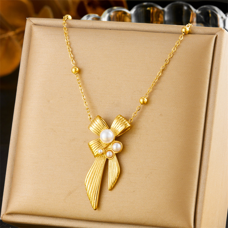 European and American style high-end pearl bow confetti stainless steel pendant chain necklace earrings women's jewelry set
