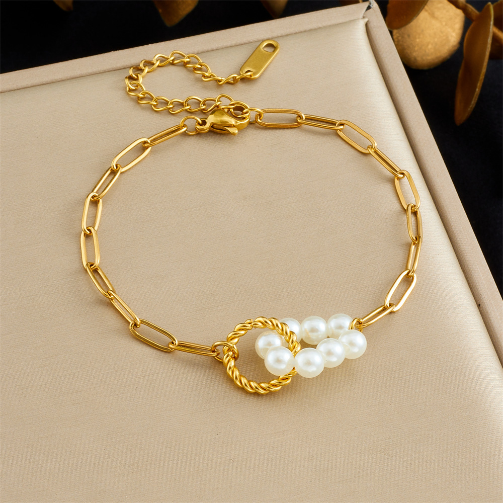 Korean-style fashionable and versatile design pearl, flower, seashell, full diamond star eye accessory, double-layer bracelet.