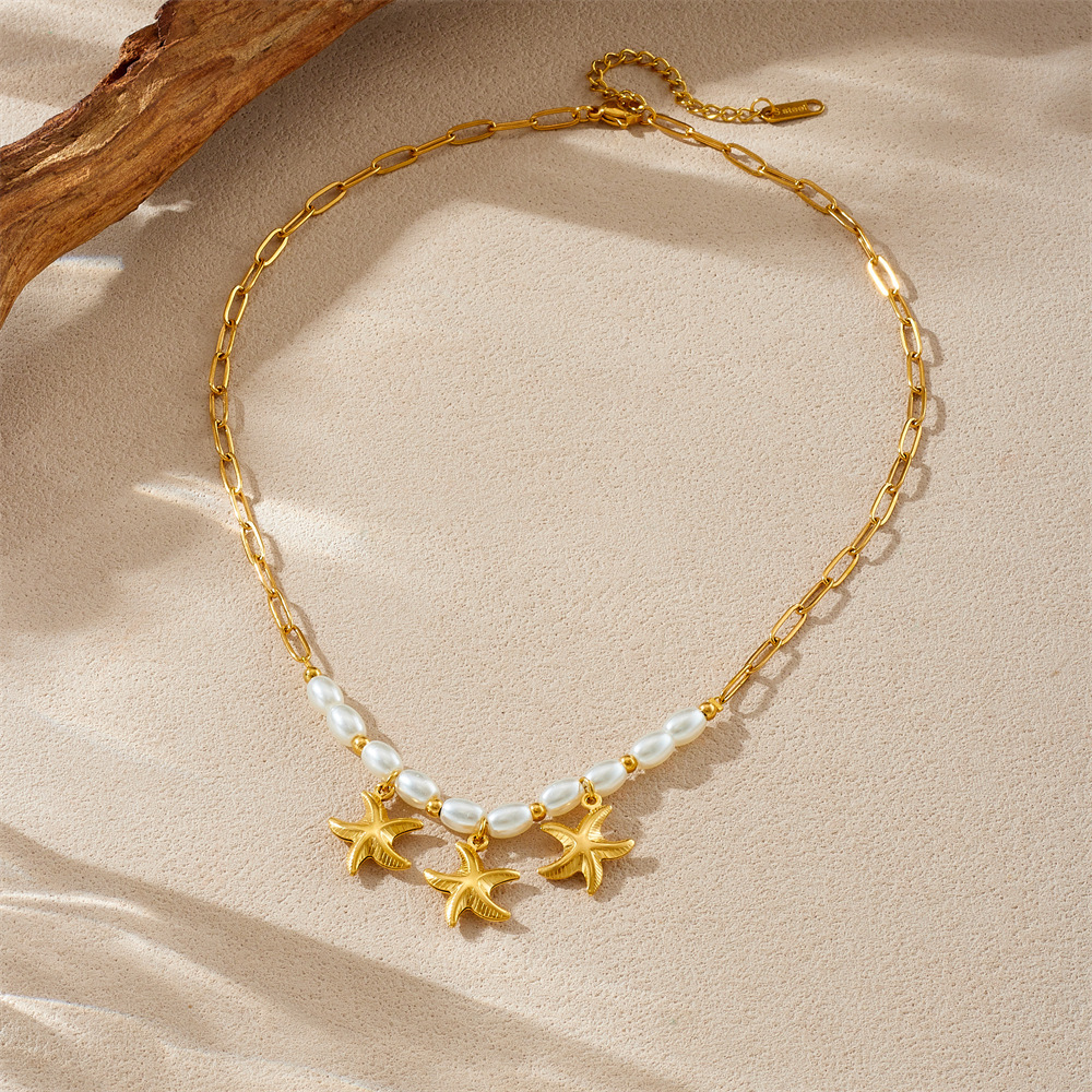 Cross-border fashion gold-plated starfish pendant chain, imitation pearl spaced beaded clavicle chain, simple and versatile necklace.