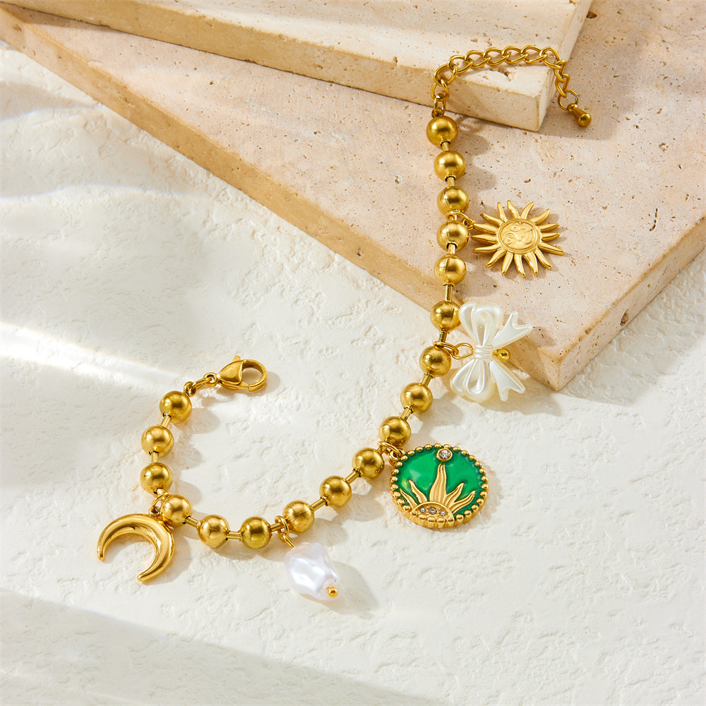 New European and American cross-border style gold-plated drip round pendant sun moon bow pearl chain stainless steel bracelet