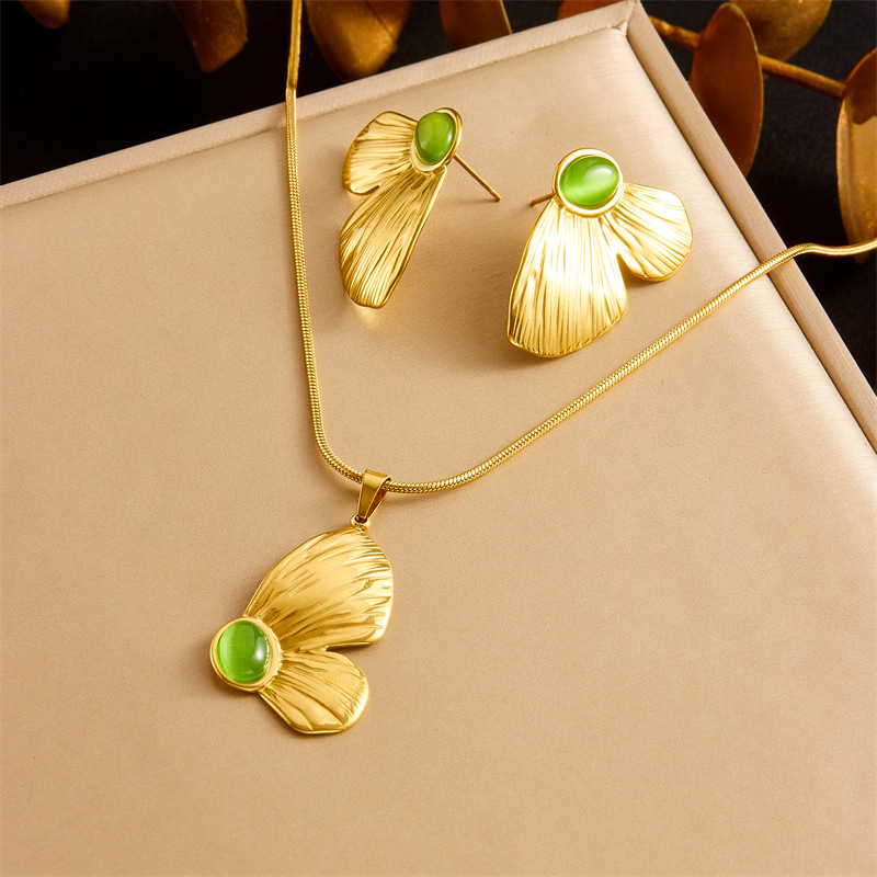 Cross-border retro oval green cat's eye stone half-butterfly necklace pendant round snake bone chain earring set