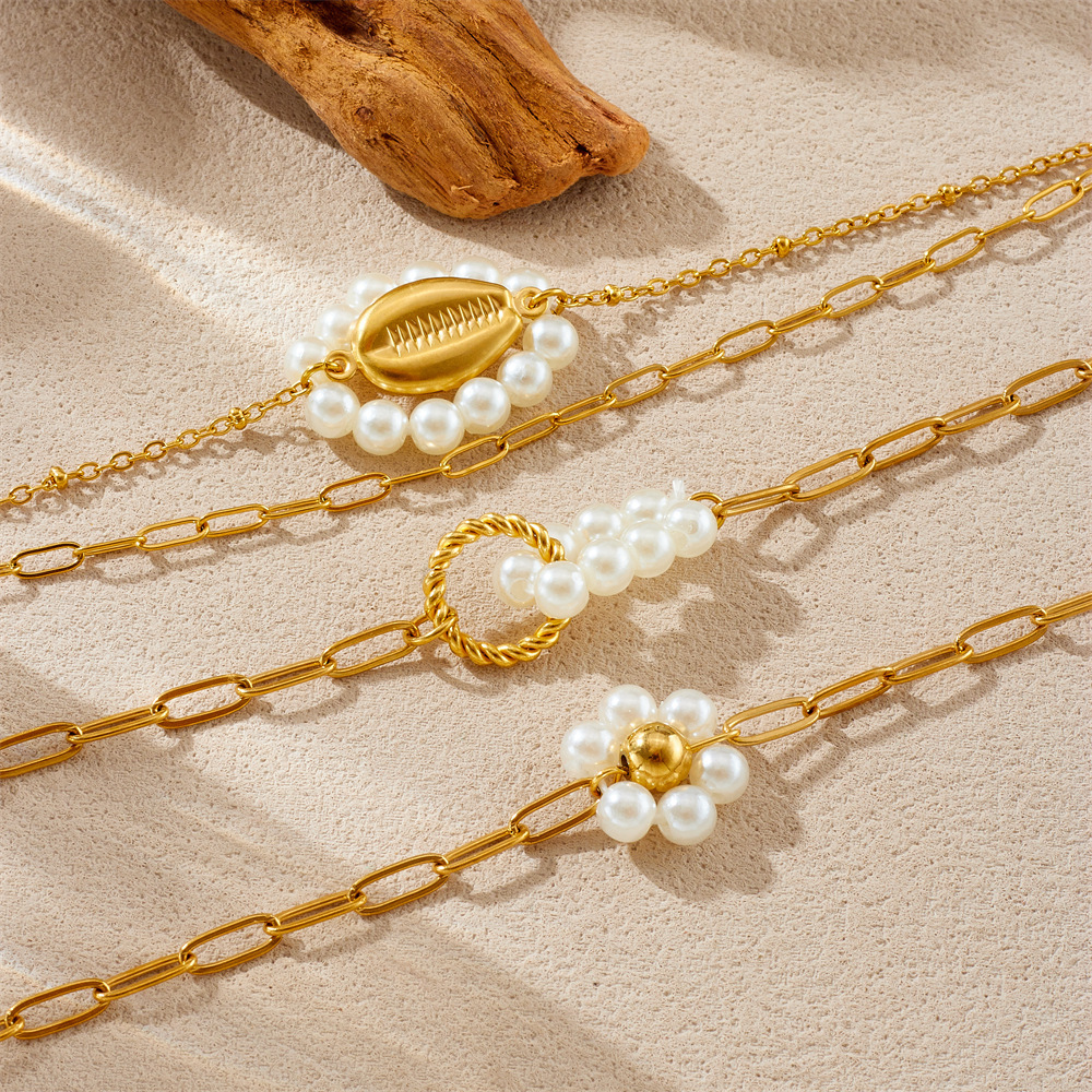 Niche fashion, retro and minimalist style, faux pearl knotted round oval gold-plated shell accessory chain bracelet