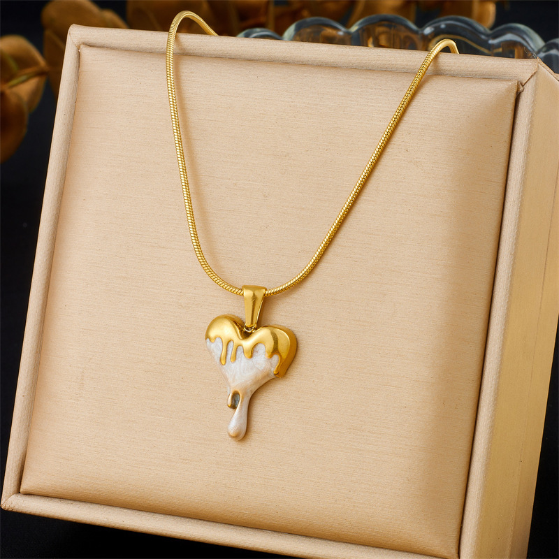 Cross-border fashion, high-end, Instagram-style gold-plated irregular heart pendant stainless steel necklace and earring set