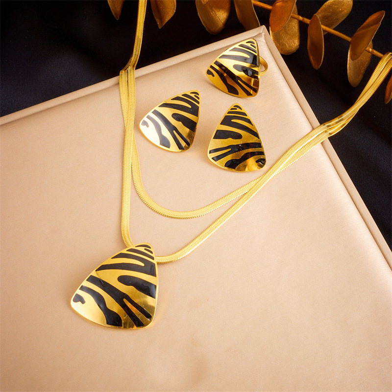 European and American style, unique retro, dripping striped triangle geometric pendant ring earring necklace three-piece jewelry set