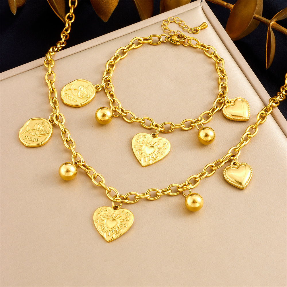 European and American cross-border retro minimalist sun heart pendant chain stainless steel gold-plated necklace and bracelet women's set