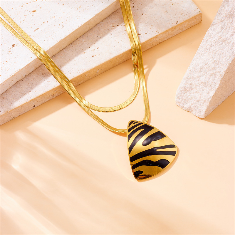 European and American style, unique retro, dripping striped triangle geometric pendant ring earring necklace three-piece jewelry set
