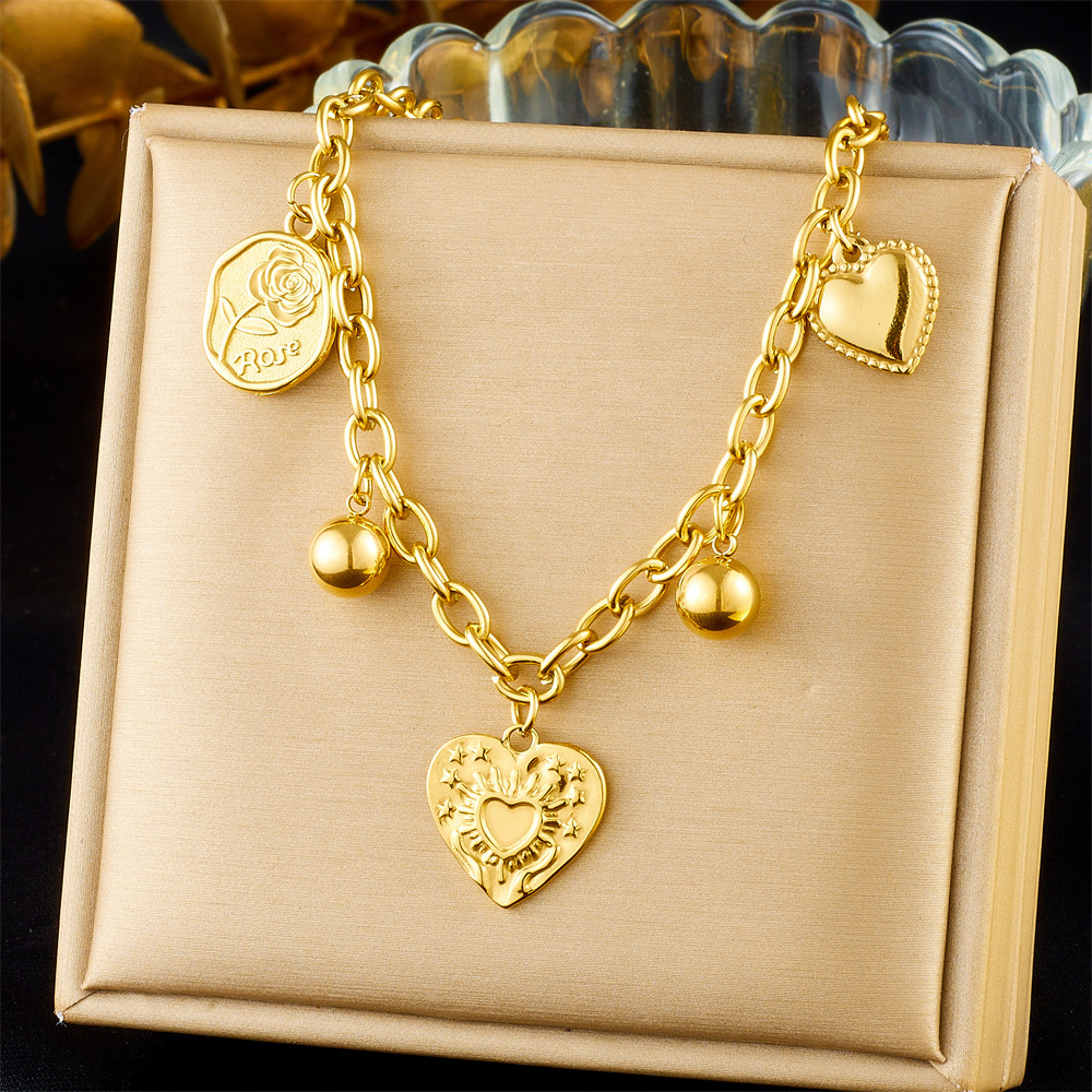 European and American cross-border retro minimalist sun heart pendant chain stainless steel gold-plated necklace and bracelet women's set