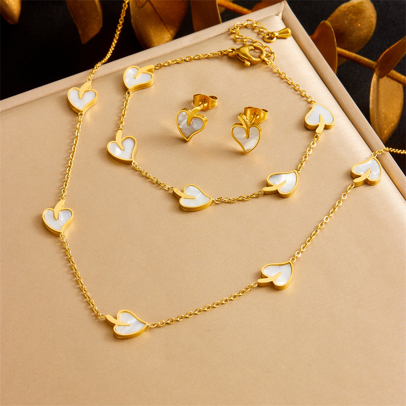 Fresh and elegant accessories, versatile white shell earrings, minimalist necklace and bracelet, stainless steel leaf set.