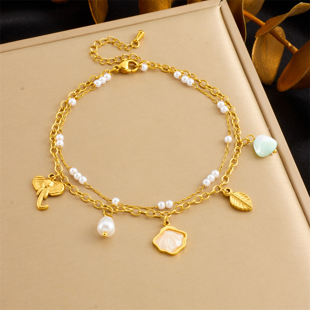 Fashionable new style, unique and fresh, versatile double-layered shell, pearl, elephant, and leaf pendant stainless steel anklet.