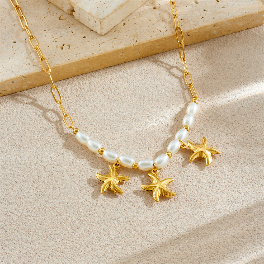 Cross-border fashion gold-plated starfish pendant chain, imitation pearl spaced beaded clavicle chain, simple and versatile necklace.