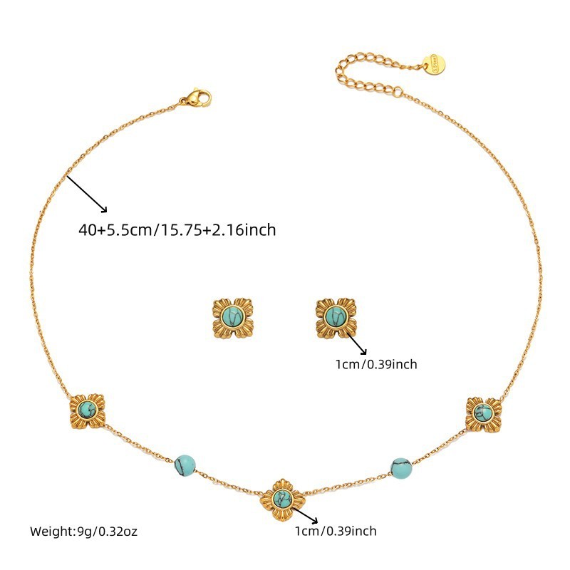 A trendy, modern Chinese-style three-piece stainless steel necklace, earrings, and bracelet set featuring four-petal flower inlay and turquoise.