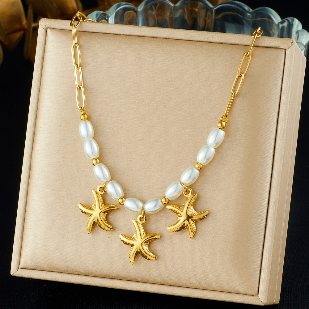 Cross-border fashion gold-plated starfish pendant chain, imitation pearl spaced beaded clavicle chain, simple and versatile necklace.