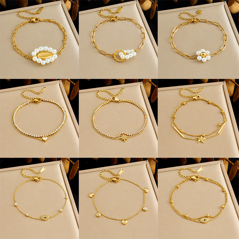 Korean-style fashionable and versatile design pearl, flower, seashell, full diamond star eye accessory, double-layer bracelet.