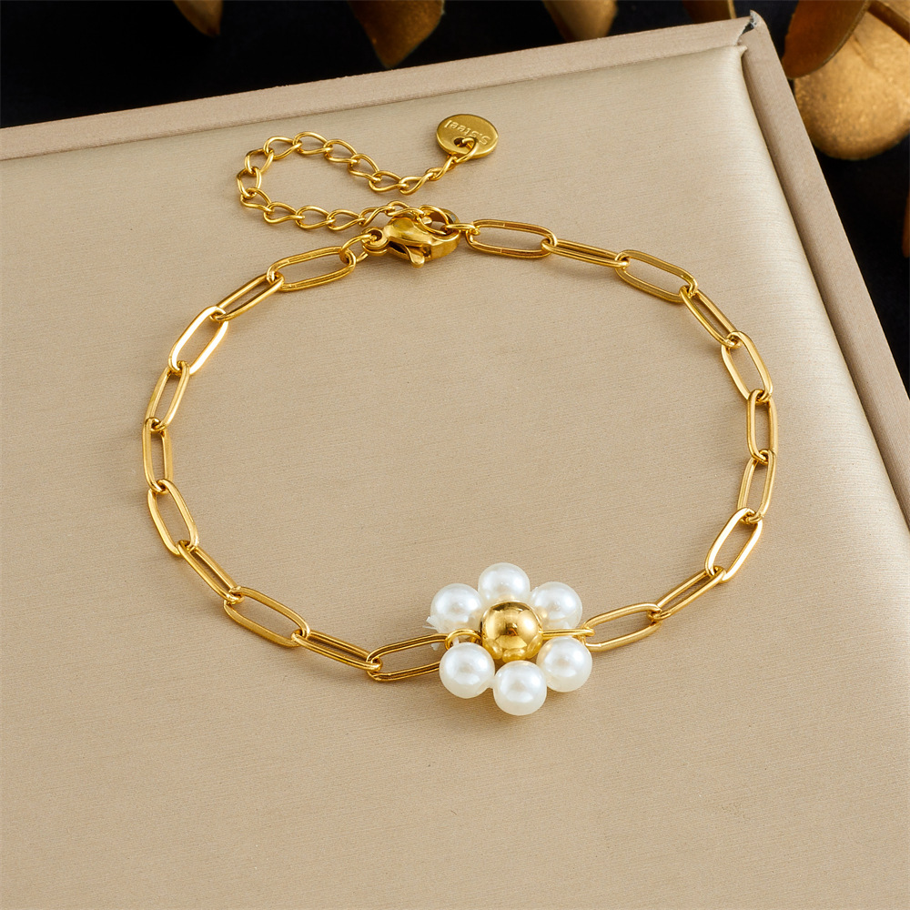 Korean-style fashionable and versatile design pearl, flower, seashell, full diamond star eye accessory, double-layer bracelet.