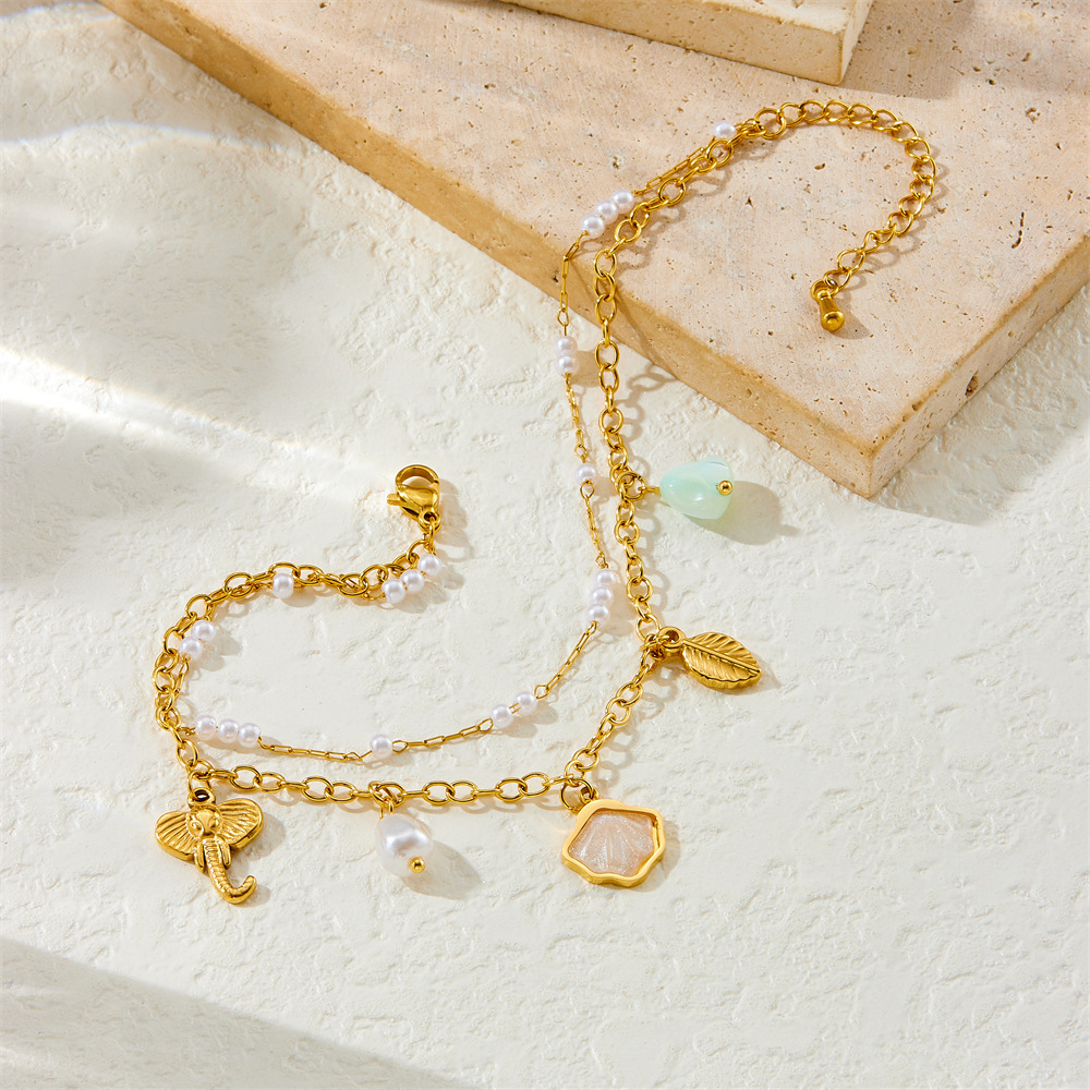 Fashionable new style, unique and fresh, versatile double-layered shell, pearl, elephant, and leaf pendant stainless steel anklet.
