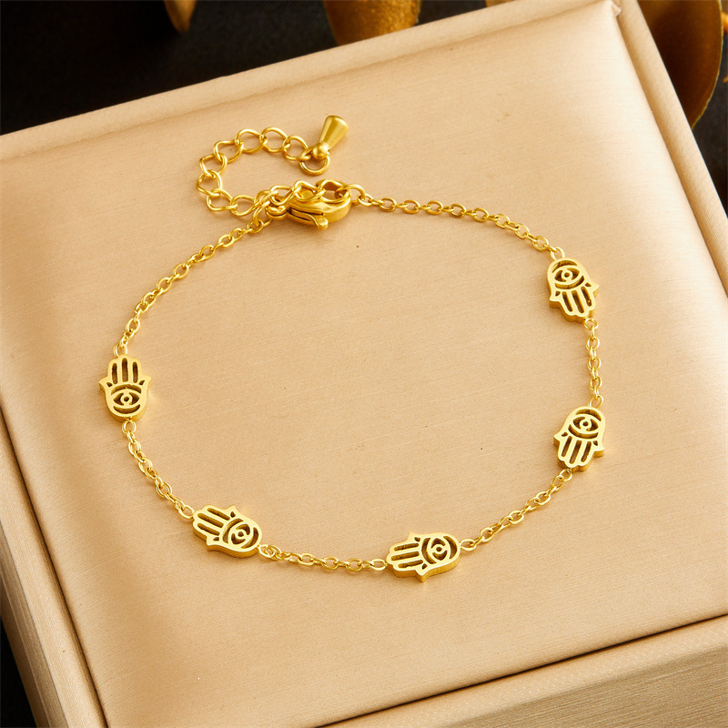 Cross-border fashion gold-plated stainless steel hollowed-out palm accessory chain necklace earrings bracelet jewelry set