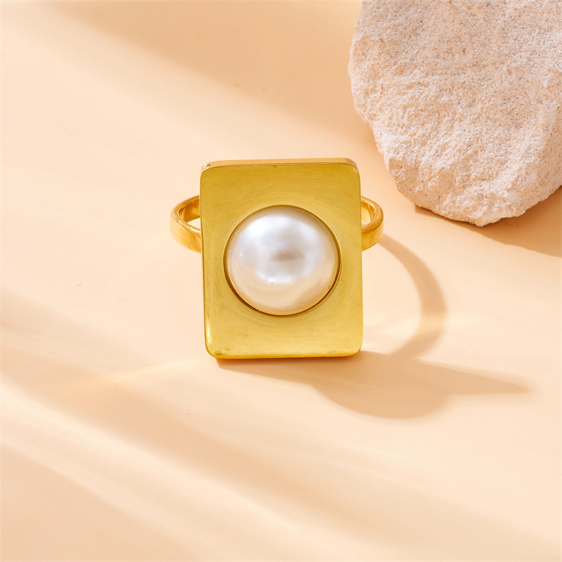Cross-border best-selling collection of irregularly shaped, square-shaped pearl-encrusted stainless steel rings, earrings, and necklaces.