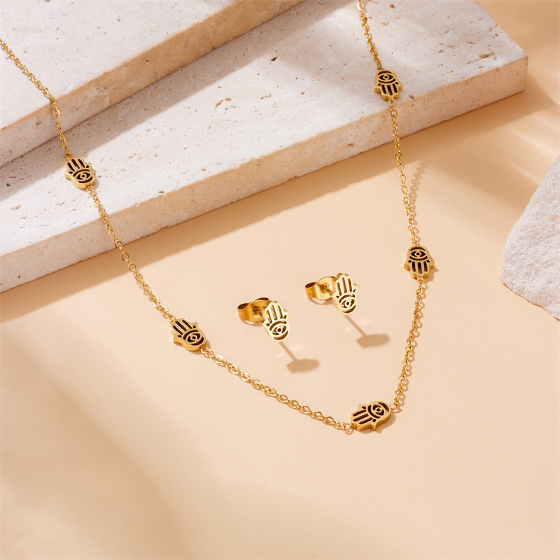 Cross-border fashion gold-plated stainless steel hollowed-out palm accessory chain necklace earrings bracelet jewelry set