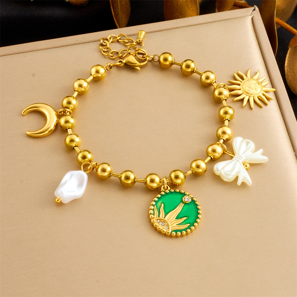 New European and American cross-border style gold-plated drip round pendant sun moon bow pearl chain stainless steel bracelet
