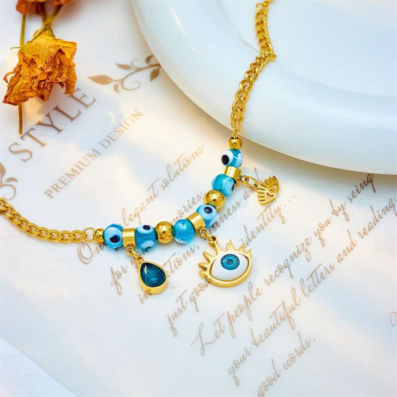European and American cross-border fashion trend blue eye beaded pendant teardrop titanium steel chain jewelry versatile metal bracelet