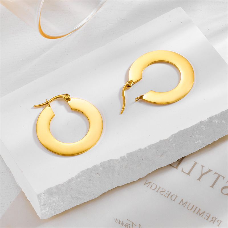 Stylish, minimalist, sophisticated, cool-toned, unique round, smooth geometric stainless steel earrings