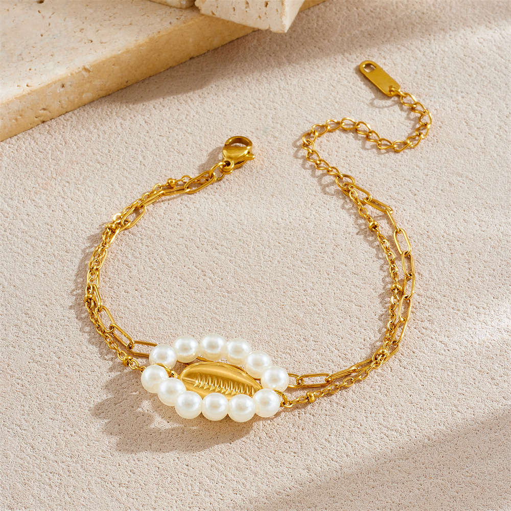 Niche fashion, retro and minimalist style, faux pearl knotted round oval gold-plated shell accessory chain bracelet