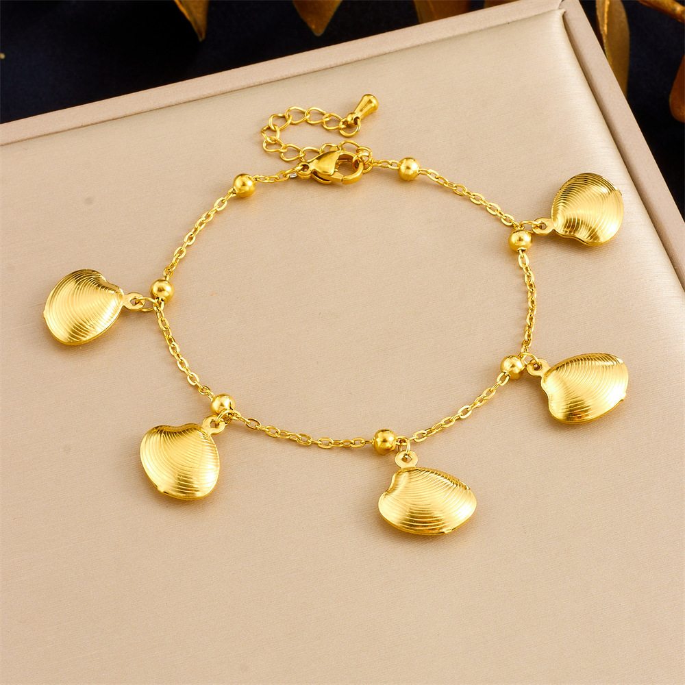 Cross-border best-selling summer ocean-themed gold-plated tropical fish, starfish, and scallop stainless steel resort-style premium bracelet