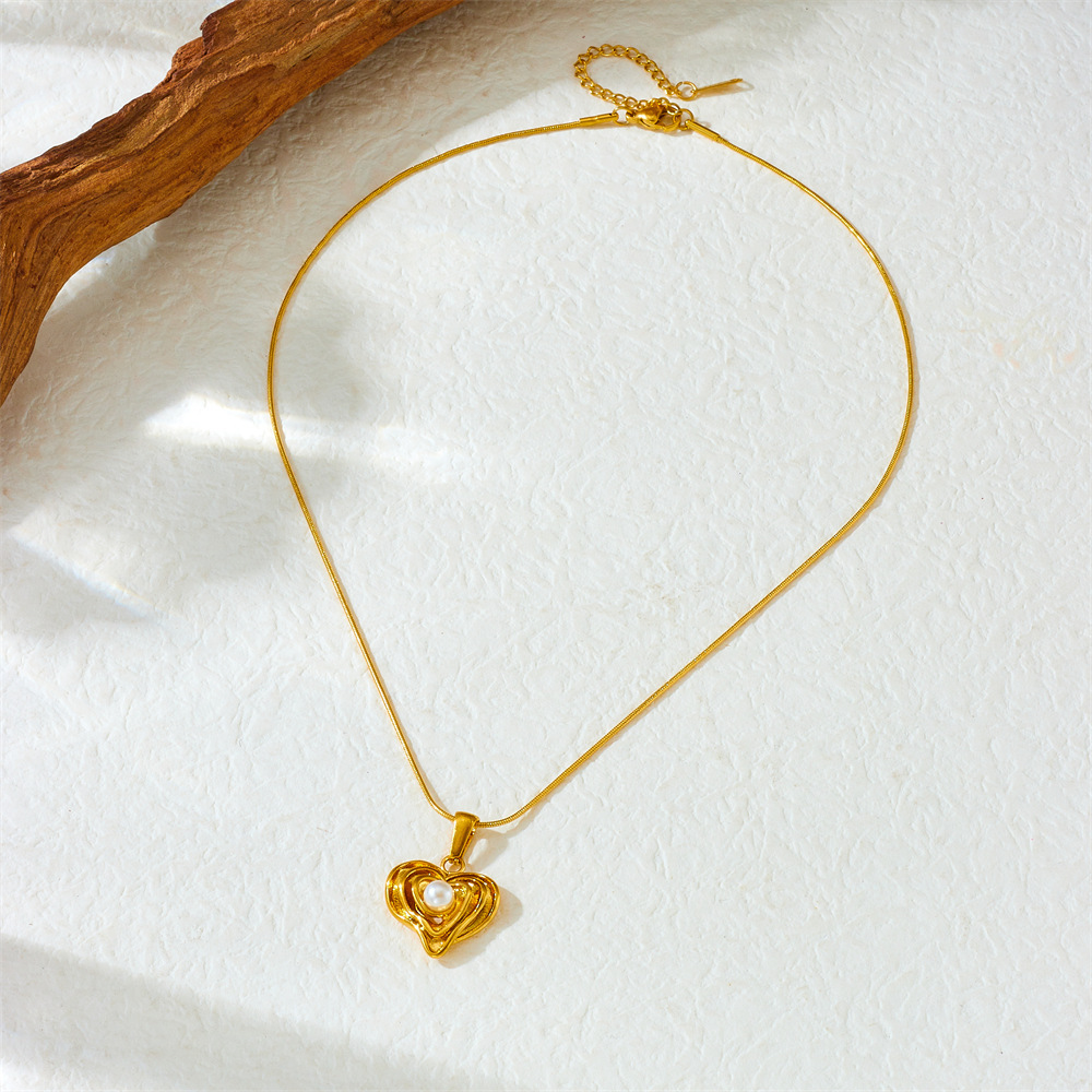 European and American style gold-plated simple and versatile irregular heart pearl pendant snake chain stainless steel jewelry necklace
