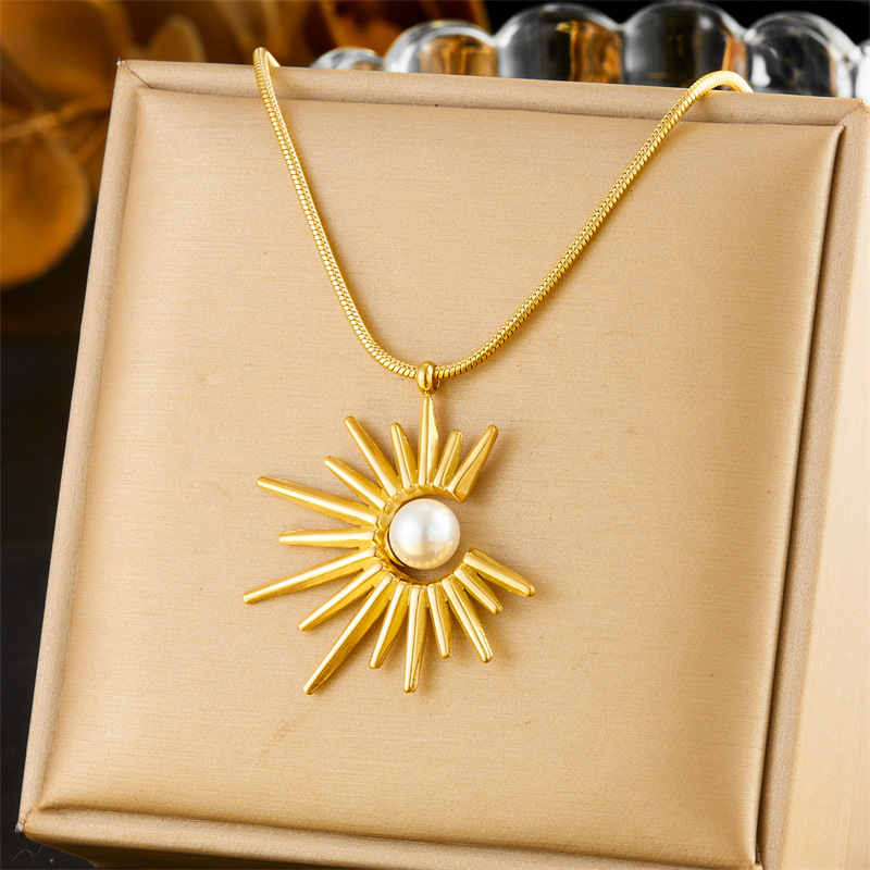 European and American style retro sunflower pearl pendant clavicle chain stainless steel necklace, earrings, and ring three-piece set