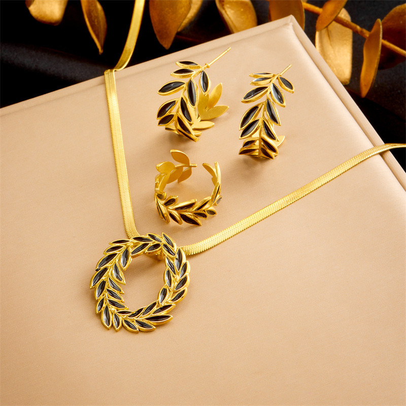 European and American style retro stainless steel black leaf gold-plated earrings, rings, necklaces, jewelry set