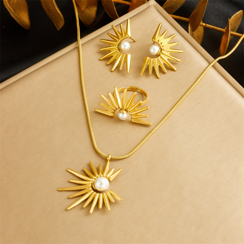 European and American style retro sunflower pearl pendant clavicle chain stainless steel necklace, earrings, and ring three-piece set
