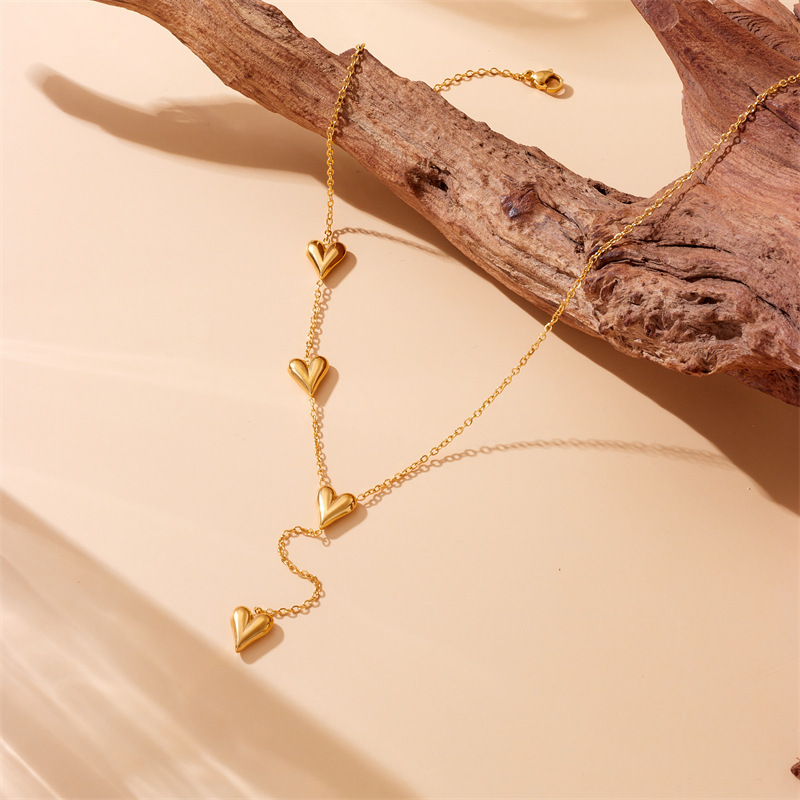 Korean style, fashionable and simple design, gold-plated, smooth heart-shaped tassel pendant chain, stainless steel jewelry necklace.