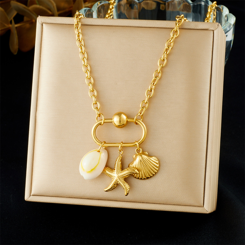 Niche design gold-plated cherry fruit and marine life pendant, gold-plated starfish, seashell, and flower accessory necklace.