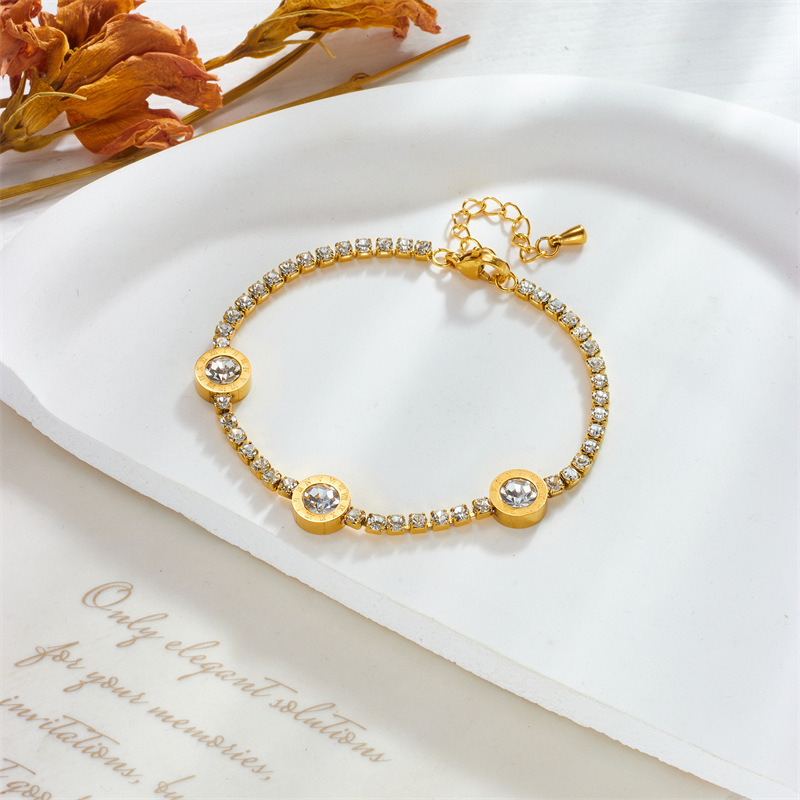 Stylish, elegant, minimalist, and luxurious diamond-encrusted Roman pendant accessory on a titanium steel bracelet.