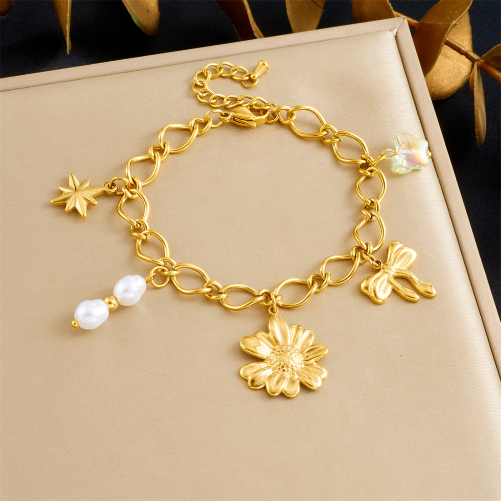 Cross-border fashion retro pearl pendant gold-plated bow flower accessory chain stainless steel bracelet