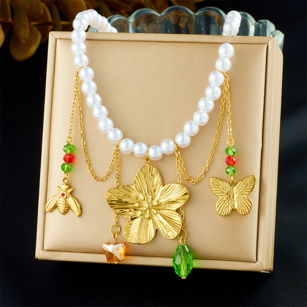 New cross-border fashion stainless steel beaded women's necklace with sunflower pendant and tassel.
