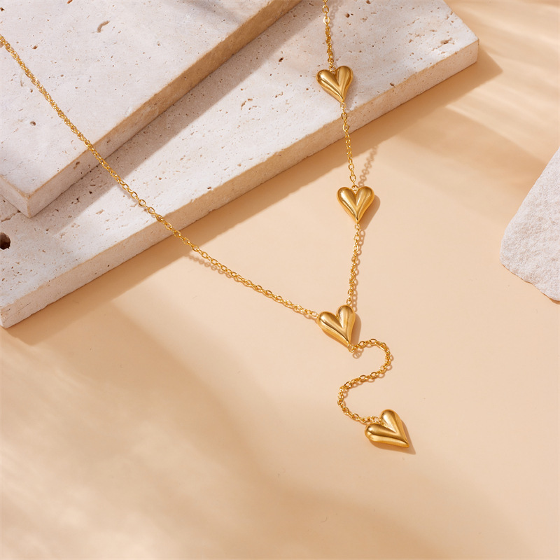 Korean style, fashionable and simple design, gold-plated, smooth heart-shaped tassel pendant chain, stainless steel jewelry necklace.