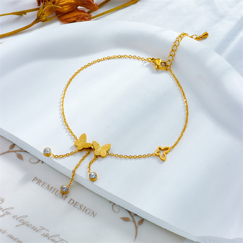 Cross-border fashion niche minimalist 3D glitter butterfly chain tassel accessories gold-plated stainless steel round diamond anklet